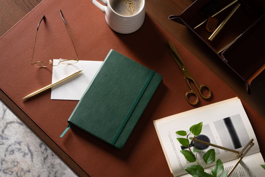 Lush Dartmouth Green A5 graph notebook, perfect for environmental science studies and nature sketches.