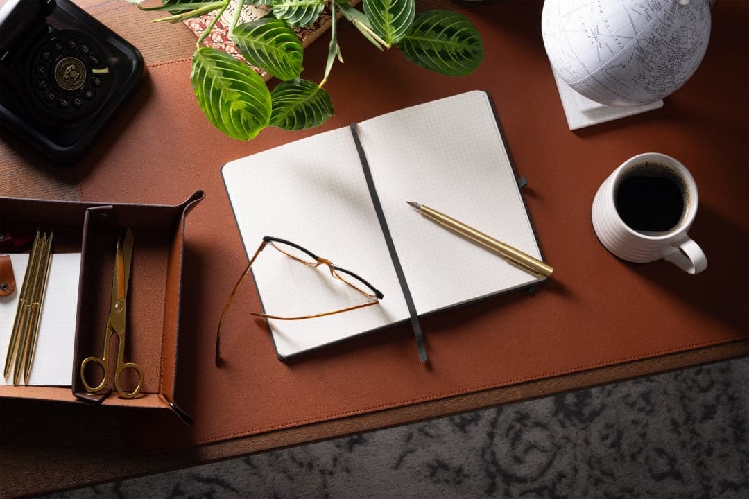 Sleek A5 Charcoal Black notebook with graph paper for detailed note-taking and planning.
