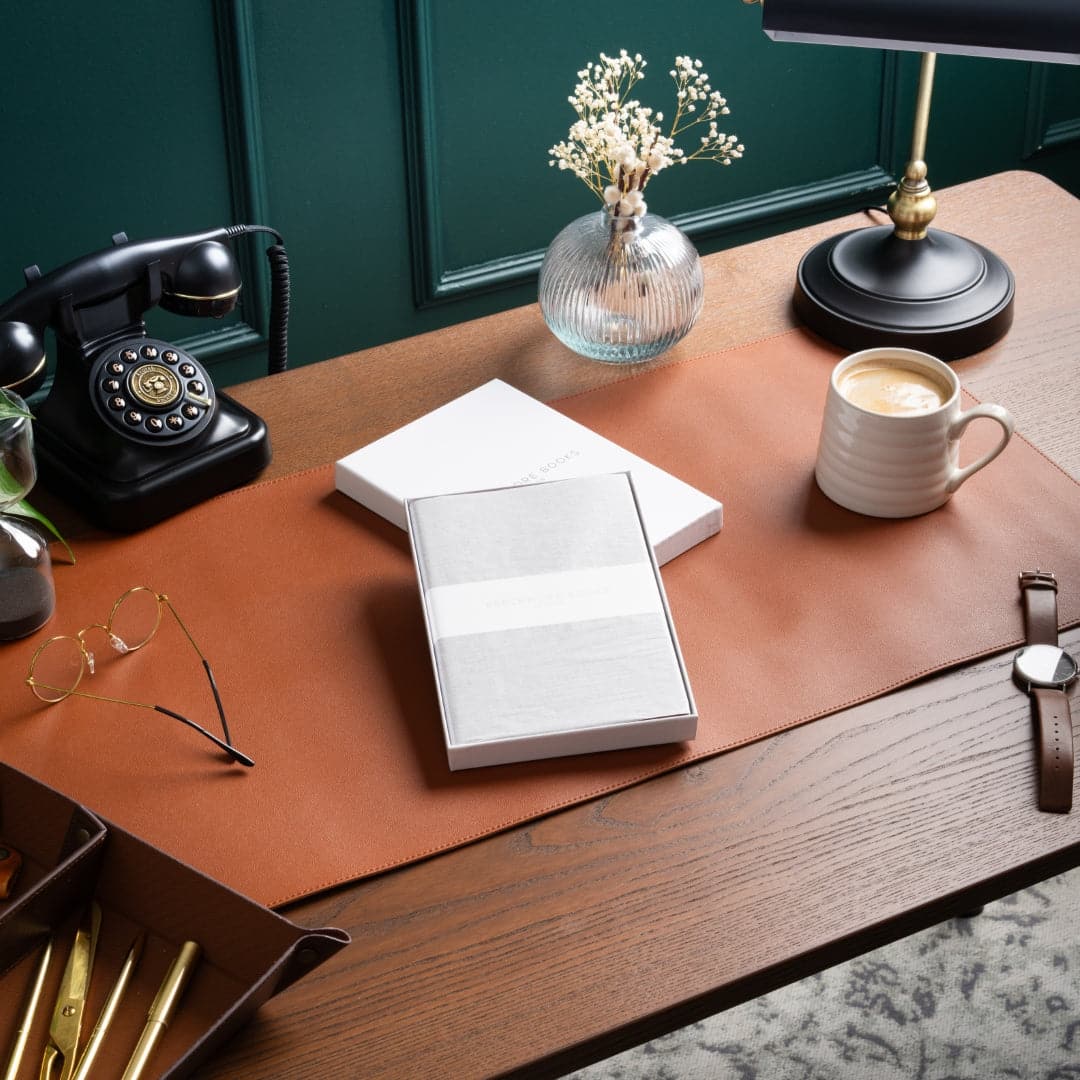 Softcover A5 notebook in vibrant Dartmouth Green, encouraging organized notes with an organic flair.